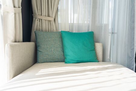 Comfortable pillow on sofa chair decoration interiorの写真素材