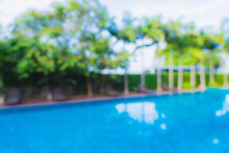 Abstract blur outdoor swimming pool in hotel resort for background