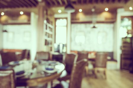 Abstract blur and defocus coffee shop cafe and restaurant interior for backgroundの写真素材
