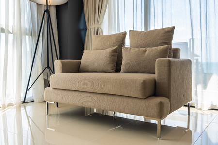 Comfortable pillow on sofa chair decoration interiorのeditorial素材