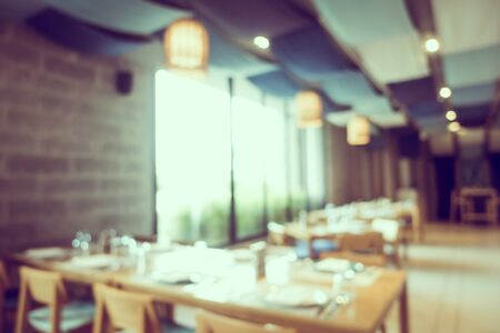 Abstract blur coffee shop and restaurant interior room for backgroundの写真素材