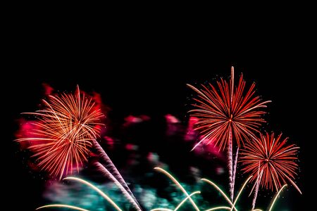 Beautiful colorful firework display at night for celebrate in anniversaryの写真素材