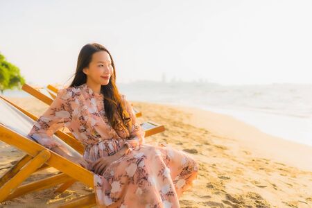 Portrait beautiful young asian women happy smile around outdoorn happy smile relax around tropical...