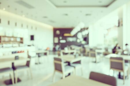 Abstract blur coffee shop and restaurant interior room for backgroundの写真素材