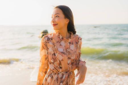 Portrait beautiful young asian women happy smile around outdoorn happy smile relax around tropical...