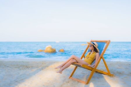 Portrait beautiful young asian women happy relax smile around sea beach ocean for travel vacation in...
