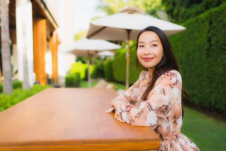 Portrait beautiful young asian women happy smile around outdoor viewの写真素材