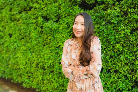 Portrait beautiful young asian women happy smile around outdoor viewの写真素材