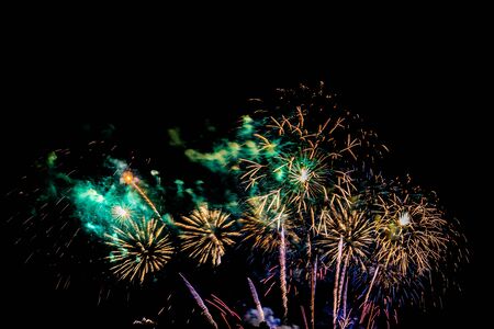 Beautiful colorful firework display at night for celebrate in anniversaryの写真素材
