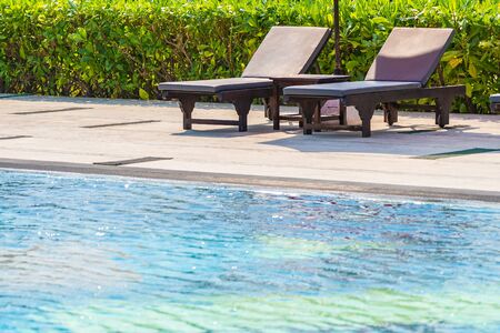 Stair around outdoor swimming pool in hotel resort for travel vacation
