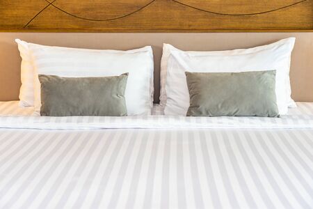 Pillow on bed decoration interior of bedroom interior with light lamp