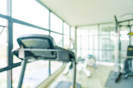Abstract blur fitness equipment in gym room interior for exerciseの写真素材