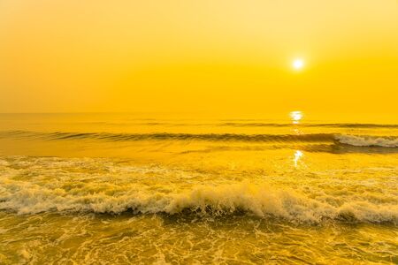 Beautiful tropical sea ocean beach at sunrise or sunset time for travel vacation