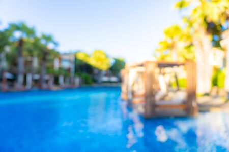 Abstract blur and defocus outdoor swimming pool in hotel resort for travel and vacation backgroundの写真素材