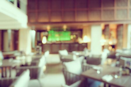 Abstract blur defocus coffee shop cafe and restaurant interior backgroundの写真素材