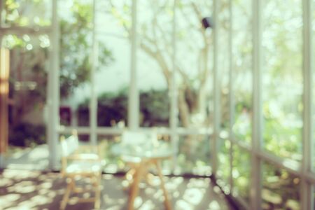 Abstract blur and defocus coffee shop cafe and restaurant interior for backgroundの写真素材