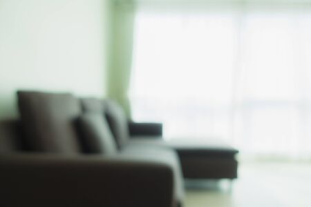 Abstract blur and defocus sofa decoration in living room interior for backgroundの写真素材