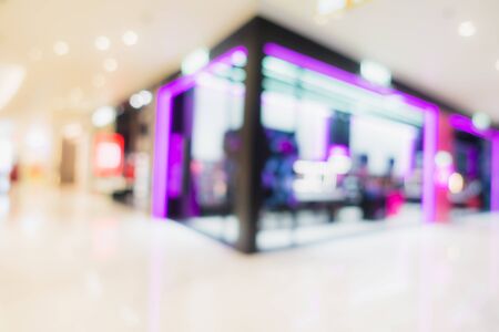 Abstract blur and defocus shopping mall in department store interior for backgroundの写真素材