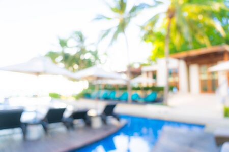 Abstract blur and defocus outdoor swimming pool in hotel resort for travel and vacation backgroundの写真素材