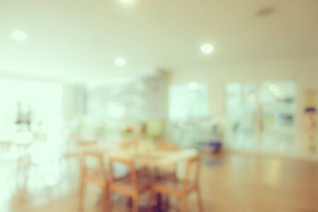 Abstract blur and defocus coffee shop cafe and restaurant interior for backgroundの写真素材