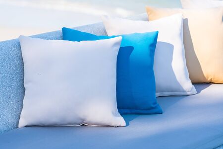 Pillow on chair or sofa lounge around outdoor patio with sea ocean beach view for travelの写真素材