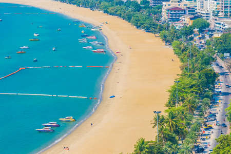 Beautiful tropical beach sea ocean bay around white cloud blue sky and architecture building in Pattaya city Thailandのeditorial素材