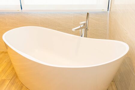 Clean white empty bathtub decoration interior of bathroomの写真素材