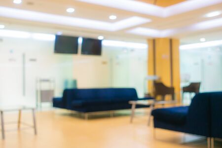 Abstract blur and defocus bokeh clinic hospital lobby with patient wating area interior for healthcare backgroundの写真素材