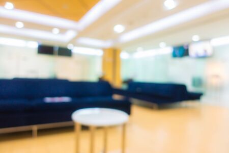Abstract blur and defocus bokeh clinic hospital lobby with patient wating area interior for healthcare backgroundの写真素材