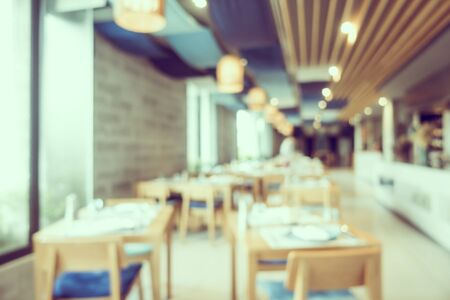 Abstract blur coffee shop and restaurant interior room for backgroundの写真素材