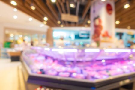 Abstract blur and defocus supermarket of shopping mall in department store interior for backgroundの写真素材