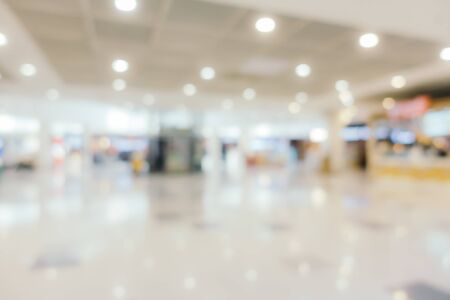 Abstract blur and defocus shopping mall in department store interior for backgroundの写真素材