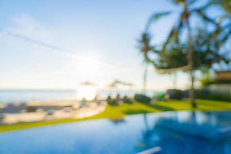 Abstract blur and defocus outdoor swimming pool in hotel resort for travel and vacation backgroundの写真素材