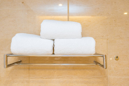 White comfortable towel in bathroom ready for useの写真素材