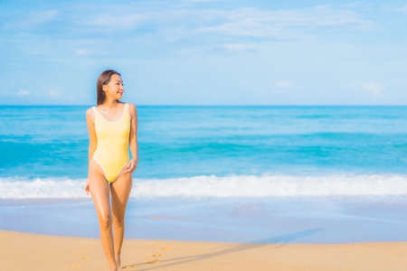 Portrait beautiful young asian woman relax smile leisure around outdoor tropical sea beach ocean in travel vacationの写真素材