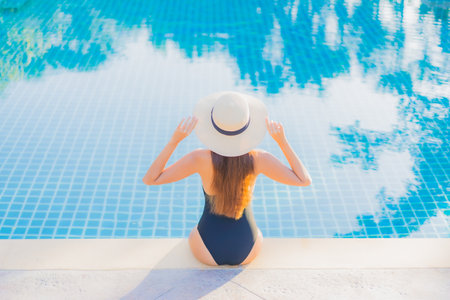 Portrait beautiful young asian woman relax smile leisure around outdoor tropical sea beach ocean in travel vacationの写真素材