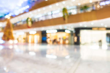 Abstract blur and defocus shopping mall interior in department store for backgroundの写真素材