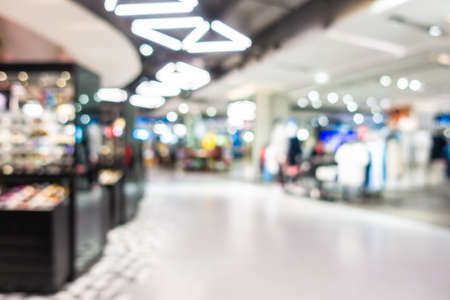Abstract blur defocus shopping mall and retails of department store interior for background
