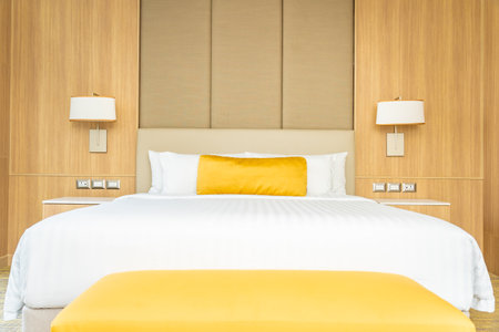 Pillow on bed with blanket decoration interior of roomの写真素材