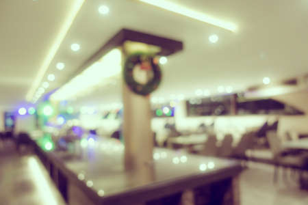 Abstract blur and defocus coffee shop cafe and restaurant interior for backgroundの写真素材