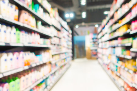 Abstract blur and defocus supermarket of shopping mall in department store interior for backgroundの写真素材