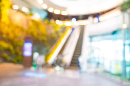 Abstract blur and defocused shopping mall retail in department store interior for backgroundの写真素材