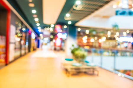 Abstract blur defocus shopping mall and retails of department store interior for background