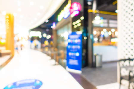 Abstract blur and defocus shopping mall and retail in department store interior for background