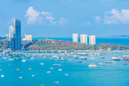 Beautiful tropical beach sea ocean bay around white cloud blue sky and architecture building in Pattaya city Thailandのeditorial素材