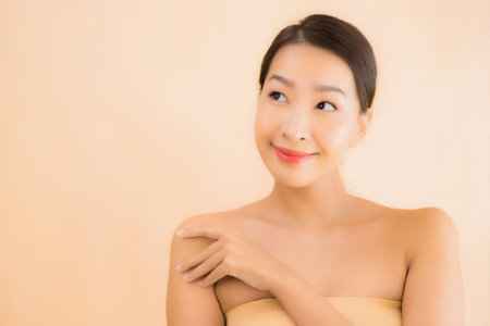 Portrait beautiful young asian face woman with beauty spa wellness and cosmetic makeup conceptの写真素材