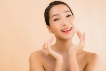 Portrait beautiful young asian face woman with beauty spa wellness and cosmetic makeup conceptの写真素材