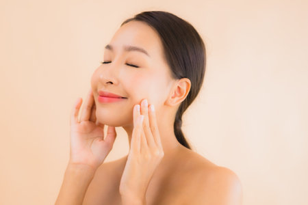 Portrait beautiful young asian face woman with beauty spa wellness and cosmetic makeup conceptの写真素材