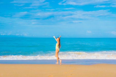 Portrait beautiful young asian woman relax smile leisure around outdoor tropical sea beach ocean in travel vacationの写真素材