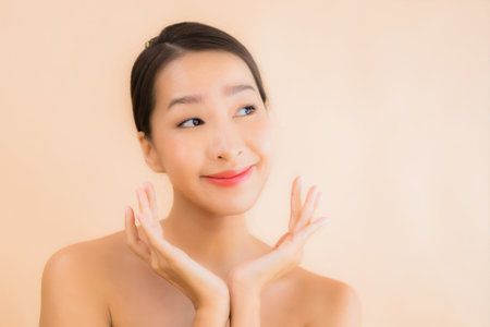 Portrait beautiful young asian face woman with beauty spa wellness and cosmetic makeup conceptの写真素材
